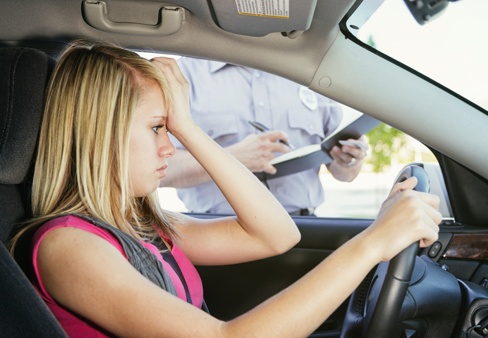 image of girl getting a ticket