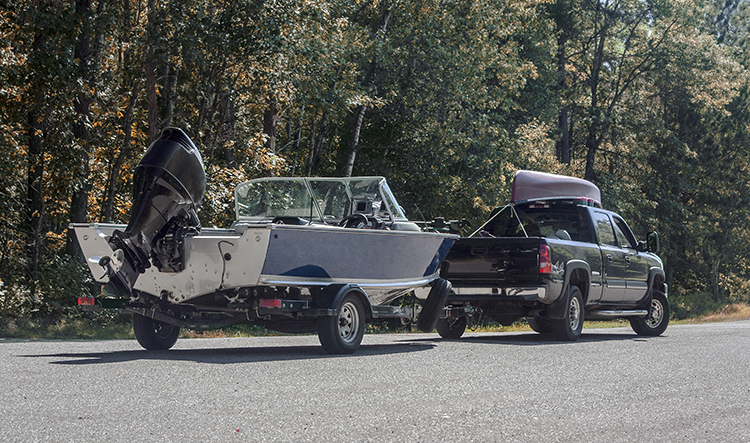 Boat being pulled by a truck