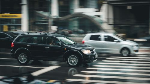 a car driving on a city street