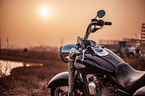 a motorcycle parked on the side of the road