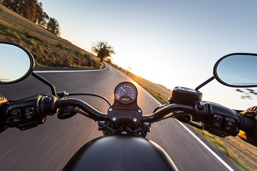 image of man riding motorcycle